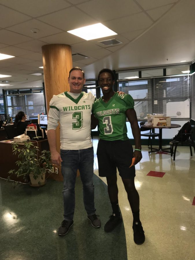 Senior Chris Manguelle (right) stands with Assistant Principal Terry Heintze.