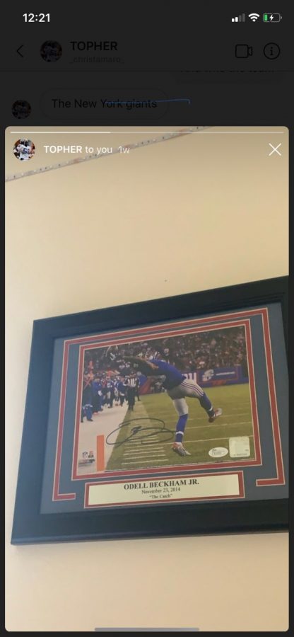 Sophomore Chris Tamaro shows off autographed Giants memorabilia of Odell Beckham Jr. making his famous one hand catch. Tamaro inherited being a Giants fan from his dad. "I like [the Giants] because my dad is from New Jersey and he grew up liking them so I started to like teams he likes." Tamaro said.