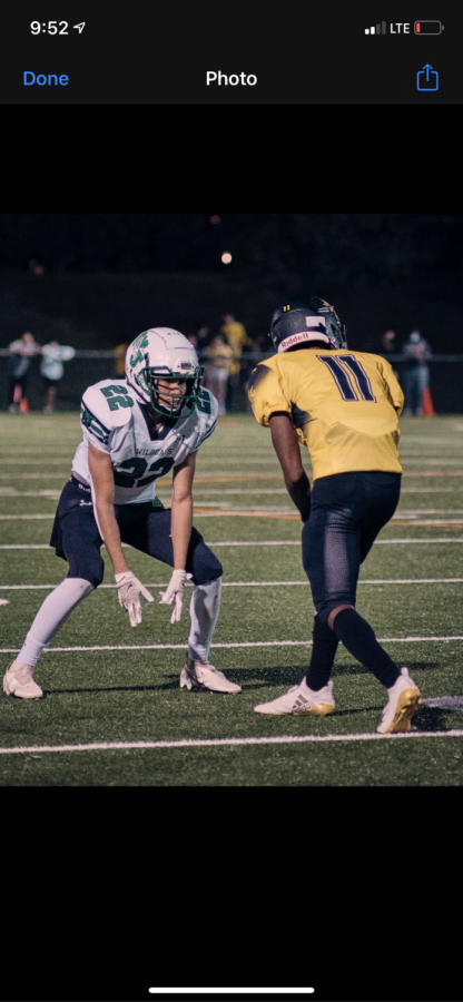 Senior Saftey Malcolm Mosby tries to cover the opposing teams reciever so that they do not score. Mosby has been on the football varsity team since middle sophomore year and his reflection on his experience is  “ Being on the team has been my motivation for everything  school related to be honest.” Football has been my passion since I was a kid and nothing makes me happier than being on the field.” “ My favorite moment was 100 when we beat BCC on their field in the playoffs.” Felt  amazing to know that my class of seniors were the best football players in all of Bethesda.”