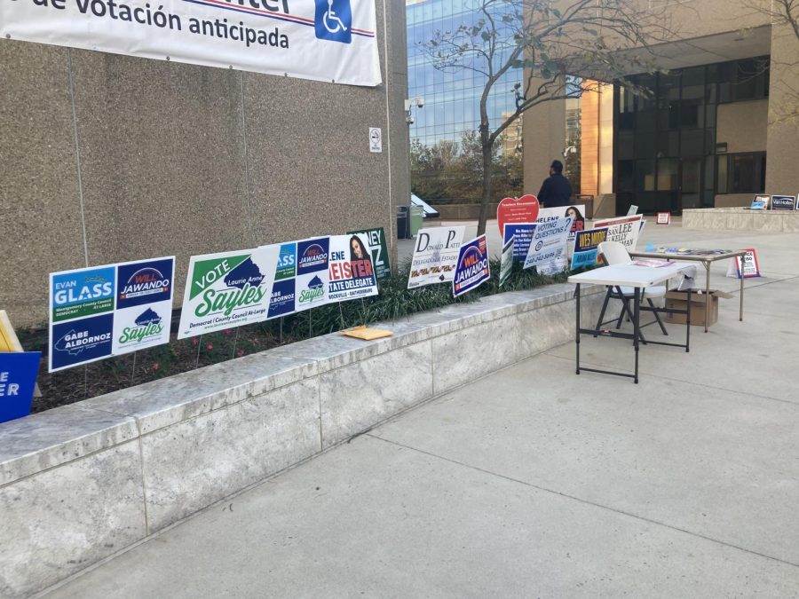 A line of campaign signs advertise various local candidates outside of the Executive Office Building in Rockville. As the midterm campaigns enter their final stretch, tens of thousands of voters from across the state have already voted by mail or in person.