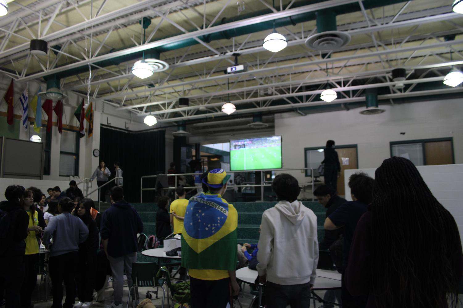 Students+watch+Brazil+vs.+Cameroon+with+Latin+club