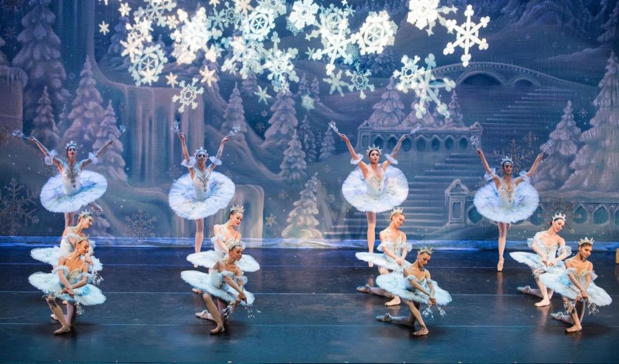 The magical Land of Snow scene dancers end the dance after guiding Clara through the winter wonderland. Principal dancers travel with the production company all across the U.S and Canada to put on the show and perform the snow scene about 70 times.