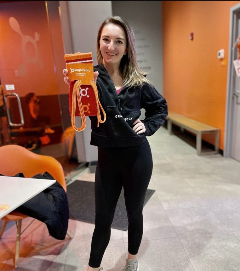 Phares shows off new Orangetheory socks and shoelaces in an Instagram post. Phares acquired the job after getting to know the manager well, while being a frequent member (going seven says a week). “She [the manager] said that they were hiring sales associates and asked if I would be interested. I was like yeah because I love the brand, I love the product and I love everything about it," Phares said.