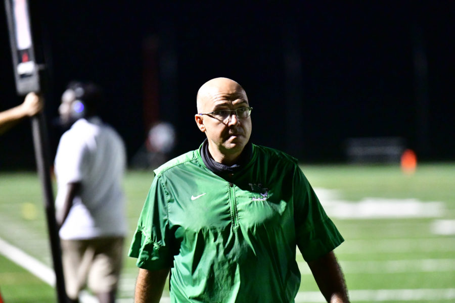 Larry Hurd Jr. coaches a game against his alma mater, MCPS football powerhouse Quince Orchard High School.