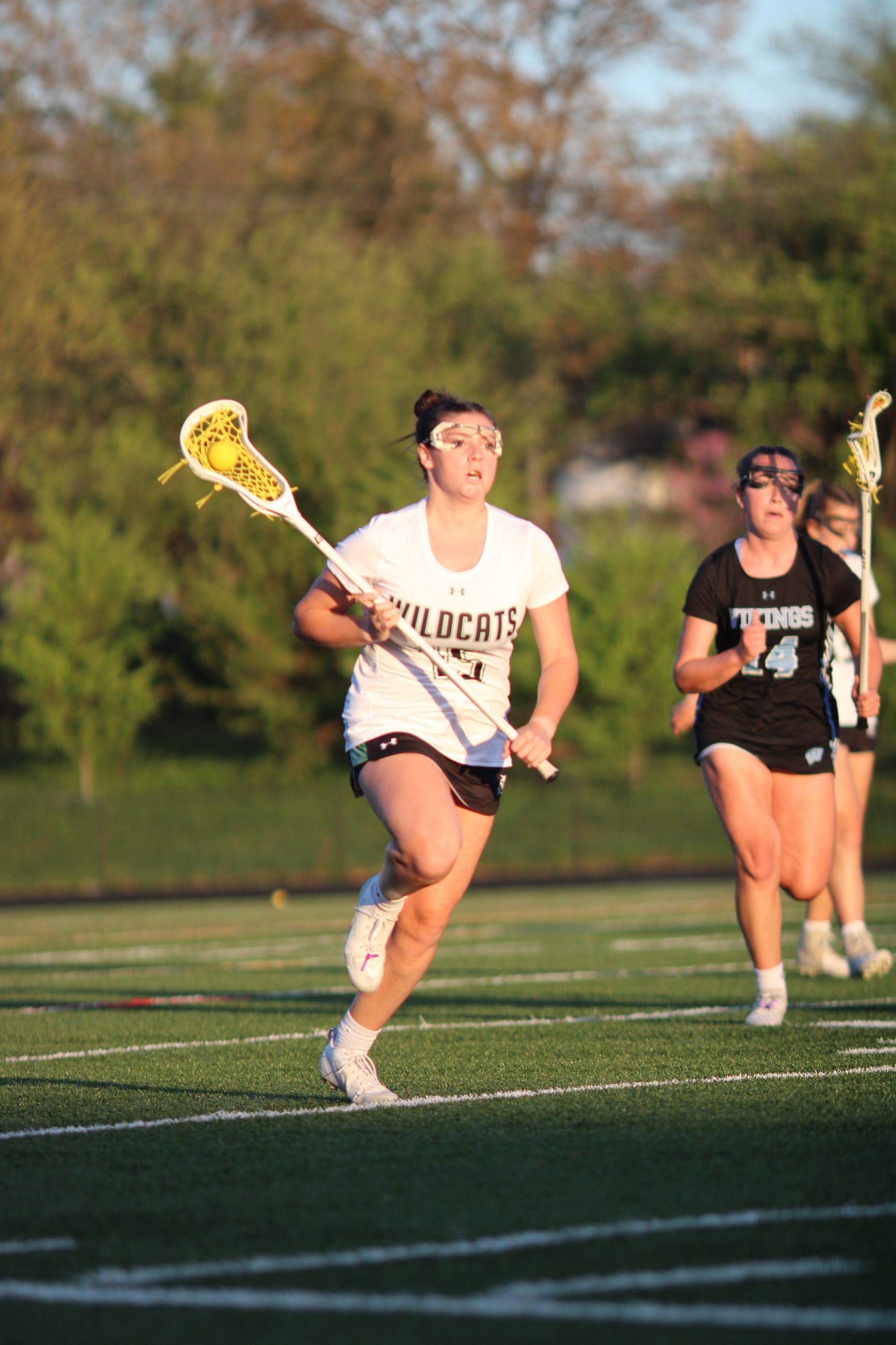 Girls' lacrosse pushes past Barons, improve to four wins