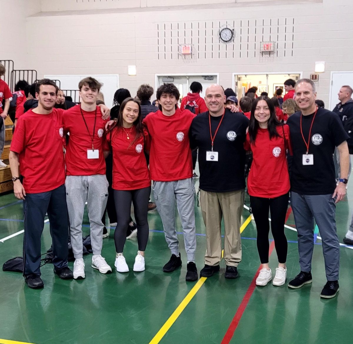 WJ SALC representatives pose for a picture with Athletic Specialist Larry Hurd Jr. and MCPS Athletics Director Jeff Sullivan. (Courtesy WJ Athletics via X)