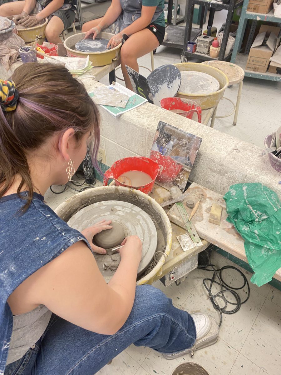 SHAPE IT! Junior Birch Robinson uses a potters wheel in her ceramics class to make a small bowl for her friend. She made a chip and dip bowl by carving out the shape and making the edges smoother. “I’m making a chip and dip bowl for Seren because she likes guacamole,” Robinson said.