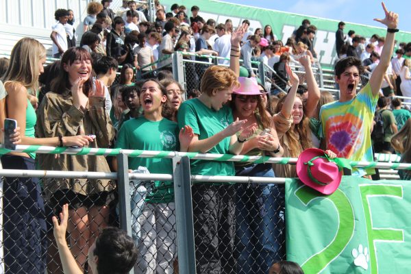 A group of seniors triumphantly celebrate their class' victory in the class tug-of-war. It is the fourth consecutive year the seniors have won the fall tug-of-war.