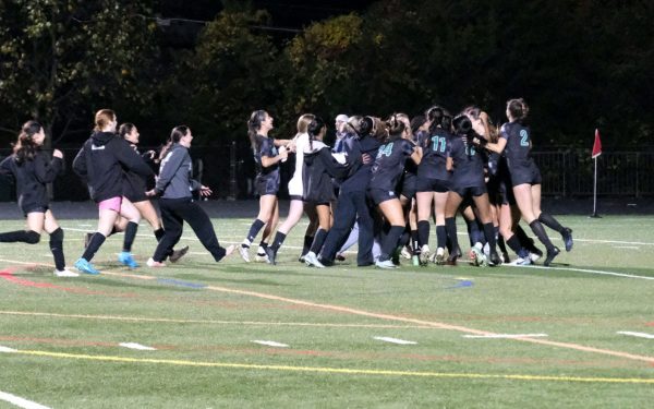 The Wildcats storm the field following the game-sealing penalty kick from goalie Chloe Russ. After an action-filled 3-2 win in penalty kicks, WJ was full of excitement.