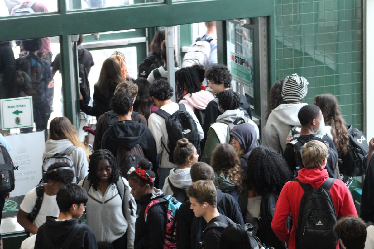 Students exit WJ after school on Tuesday, Oct. 1. Exiting through the front door in the afternoon often involves waiting in a long line. “We got way too many kids here; it’s ridiculous,” freshman Veer Anand said.