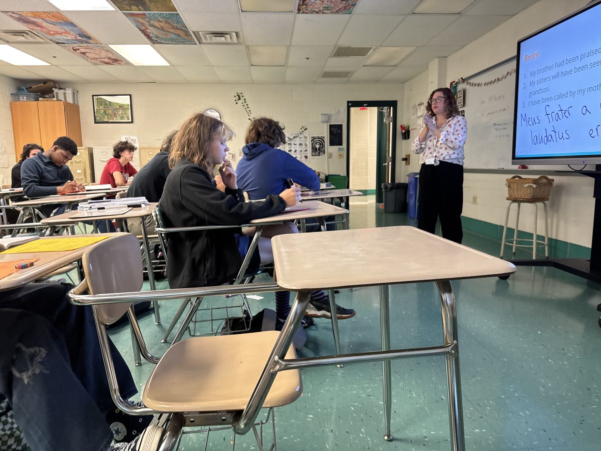 Karen Generose reviews practice sentences with her Latin Two students. Each day Generose teaches five different levels of Latin.