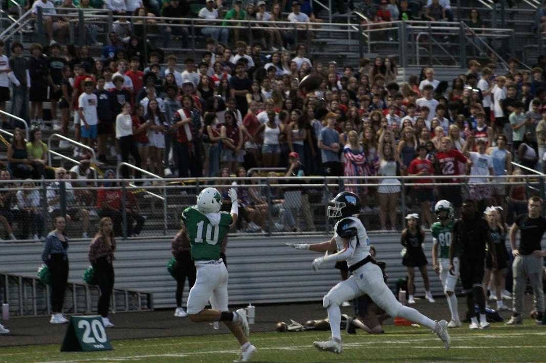 Wide receiver Devin Markert catches a pass deep into Whitman's 20'. WJ dominated Whitman 41-0 on a Thursday night home game. The student section watched as the play unfolded.