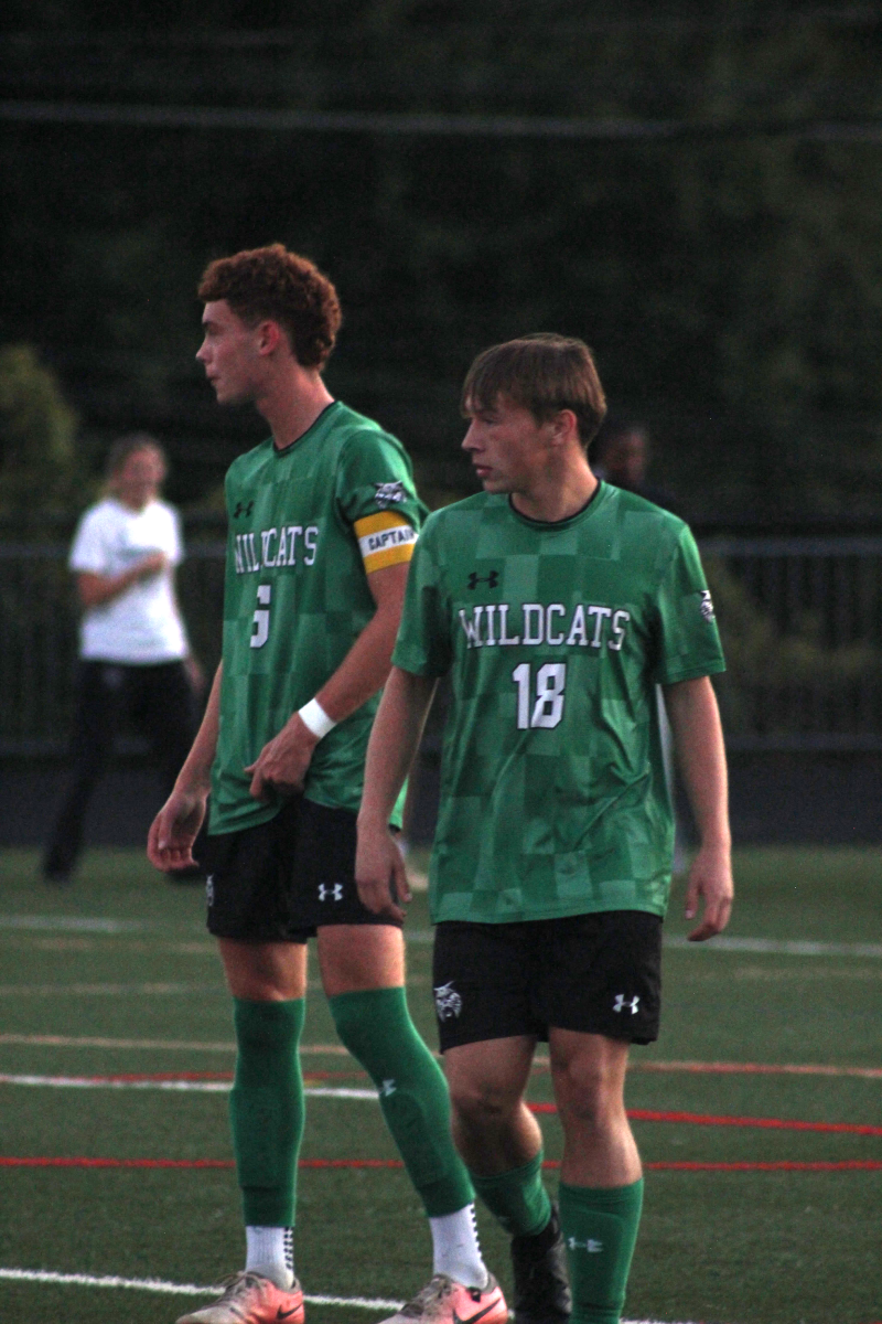 Senior Captain Jakob Lindsay and Junior Quincy Hunter-Willaims both take a moment to catch their breathe during a ref-stoppage. The Cats would go on to knock off Northwest 1-0 in a late-game thriller. (Courtesy Johnny Abrams)