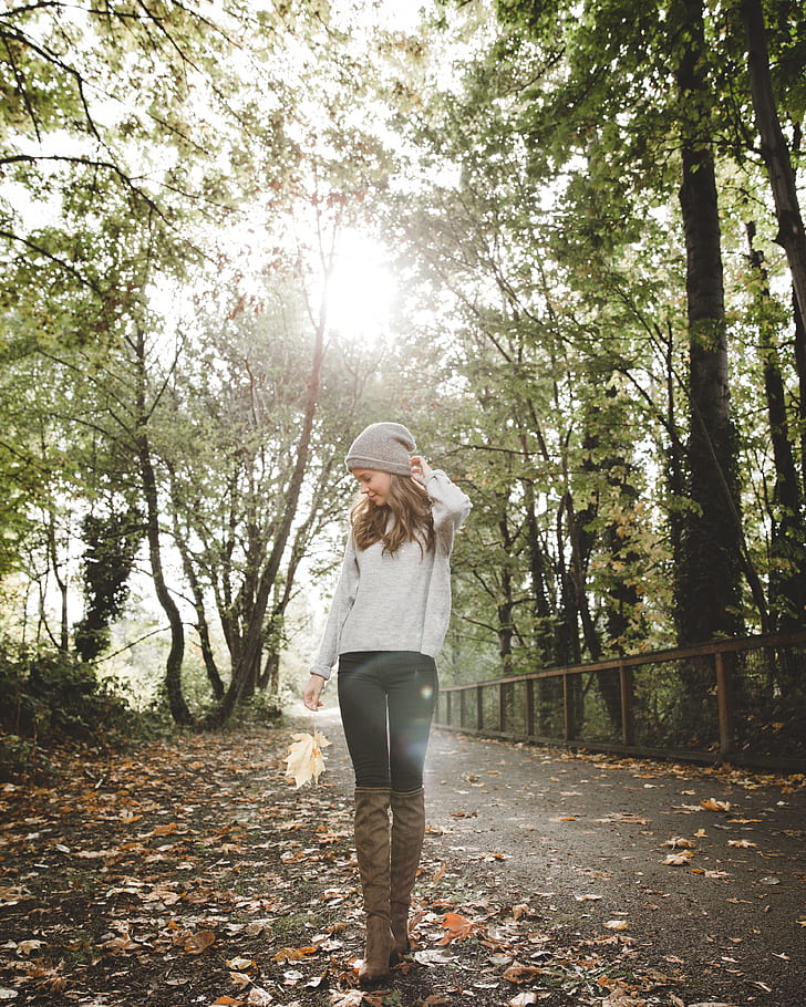 The woman poses for her fall photo shoot in an outfit she found inspiration for on Instagram. She wore ripped jeans, a jacket and statement sneakers, showing how the trends from the early 2010s have continued for years. (Courtesy PickPik)