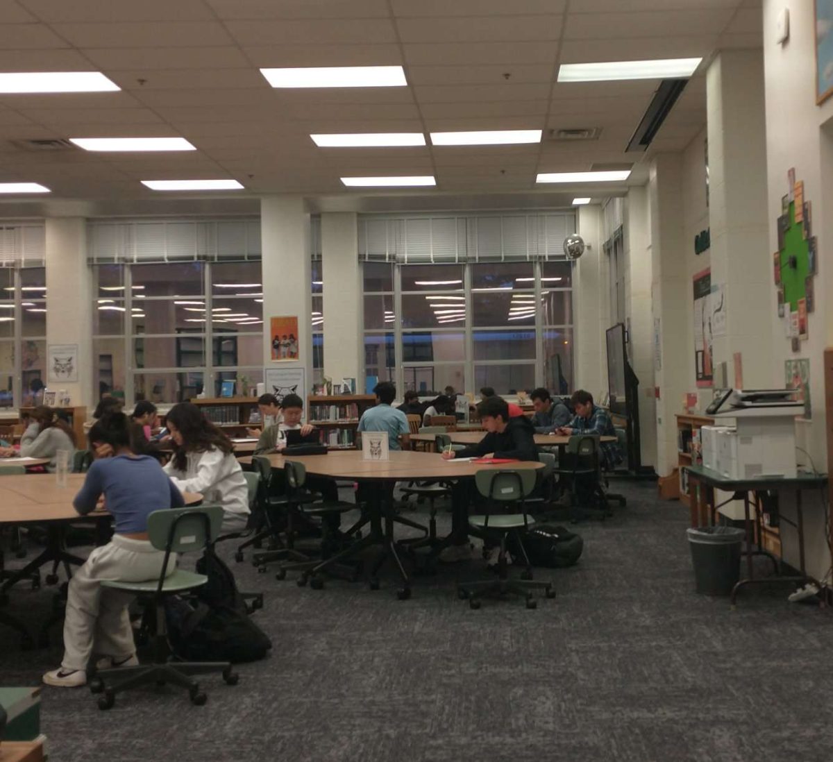 WJ students sit in the school's library in the morning. There are already many students, with even more coming to study for upcoming tests or relax before the school day.