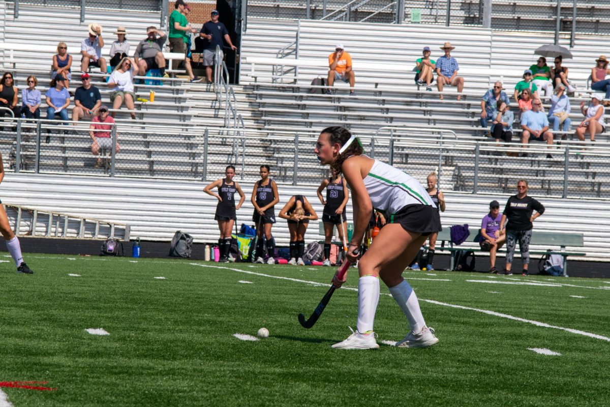 Senior captain Jackie Fuller controls the ball inside the opposing team's defensive half. The Cats rely heavily on their defense to help keep the game close week after week.