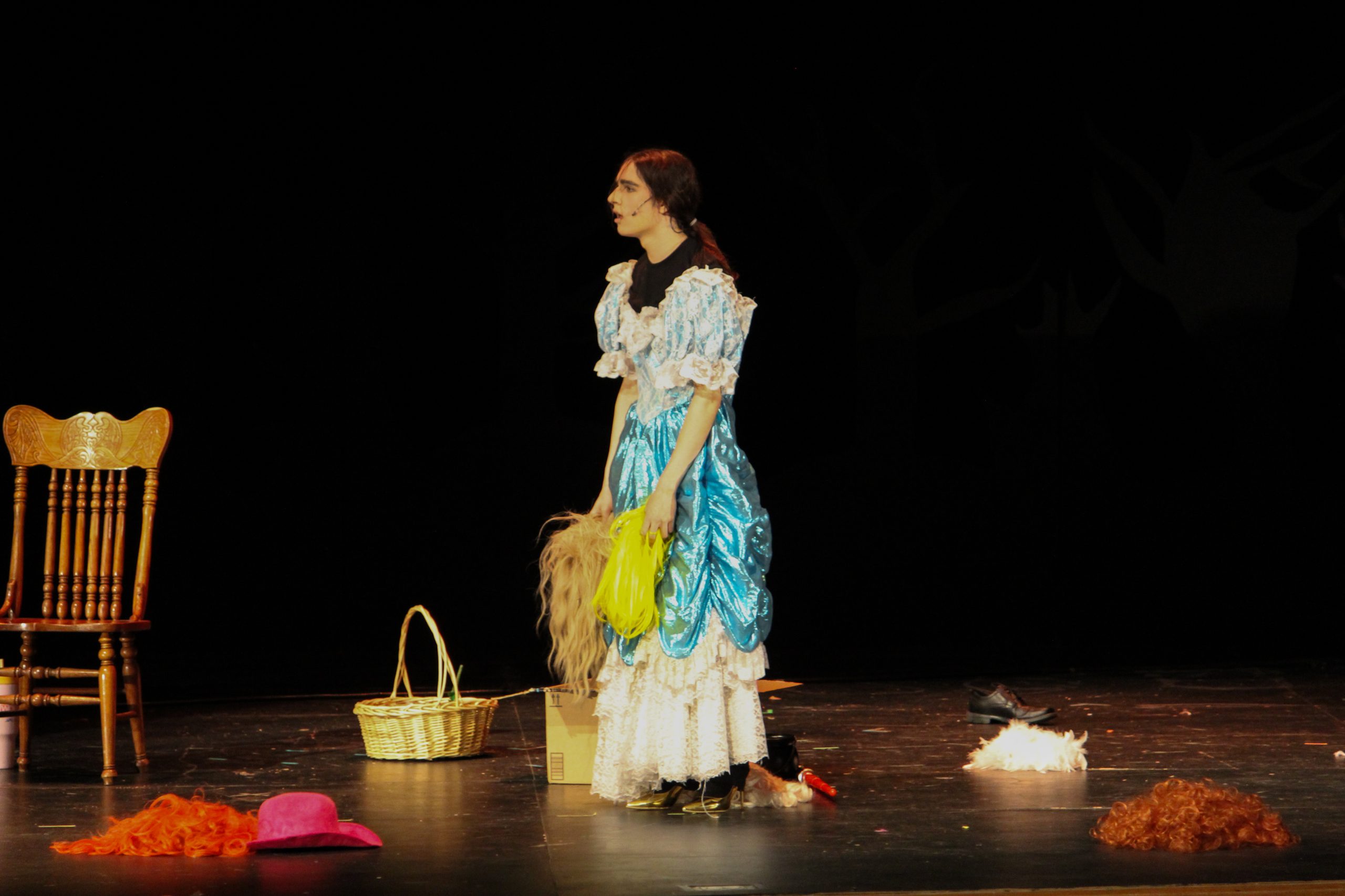 Sophomore Kolton Sidhu, playing The Actor, stares in dismay at the narrators upon learning how complex the scene will be. It involved Sidhu frantically portraying multiple characters of the “Cinderella” tale, including a flock of birds and a one-eyed Scottish bouncer. “I thought it went really well. Every other actor that did the scene with me was very well-prepared and we had just enough time to make sure the scene was perfect before we went on,” Sidhu said.