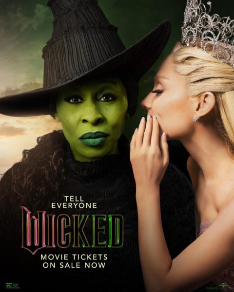 Ariana Grande as Ghilda whispering in Cynthia Erivo as Elphaba's ear. A fan edit of this poster caused controversy with Cynthia Erivo. (Courtesy Universal Pictures reused via Fair Use)