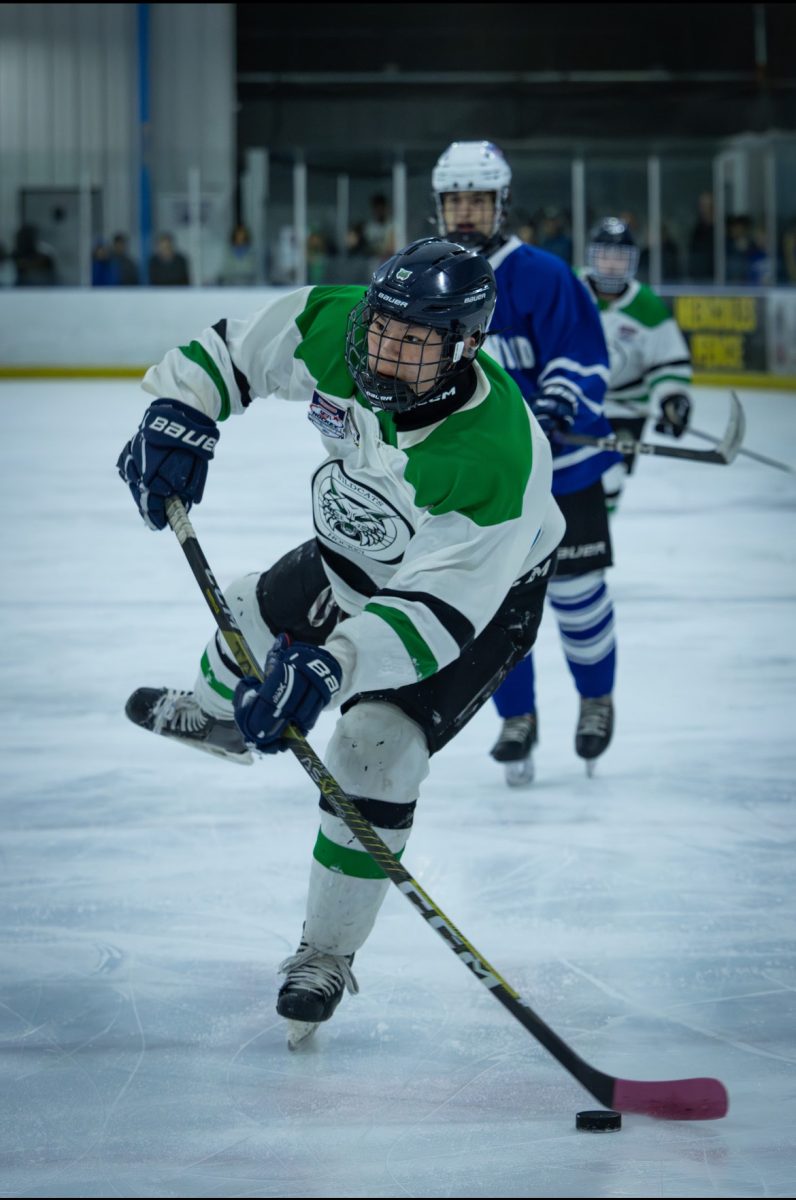 Senior Lucas Chang wrists a shot towards the goal against Sherwood. The Cat's offense is on fire helping them win five of their first six games of the season. (Courtesy Parker Kim)