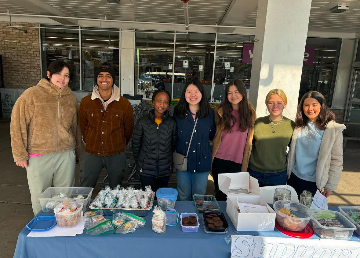 WJ DECA conducts a bake sale fundraiser last March. Advisors Timothy Rodman and Daniela Reif were required to be present at any sponsored event.