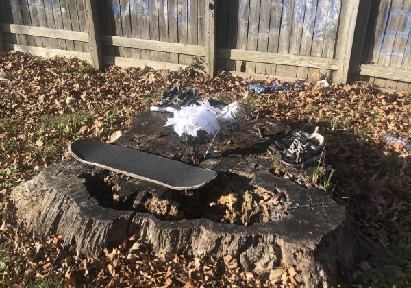 At the memorial, people leave items in memory of Martín Nolan. There is a small "Happy Birthday" balloon alongside flowers, as Nolan's birthday was just a few weeks ago on Nov. 16. It would have been his 25th birthday.