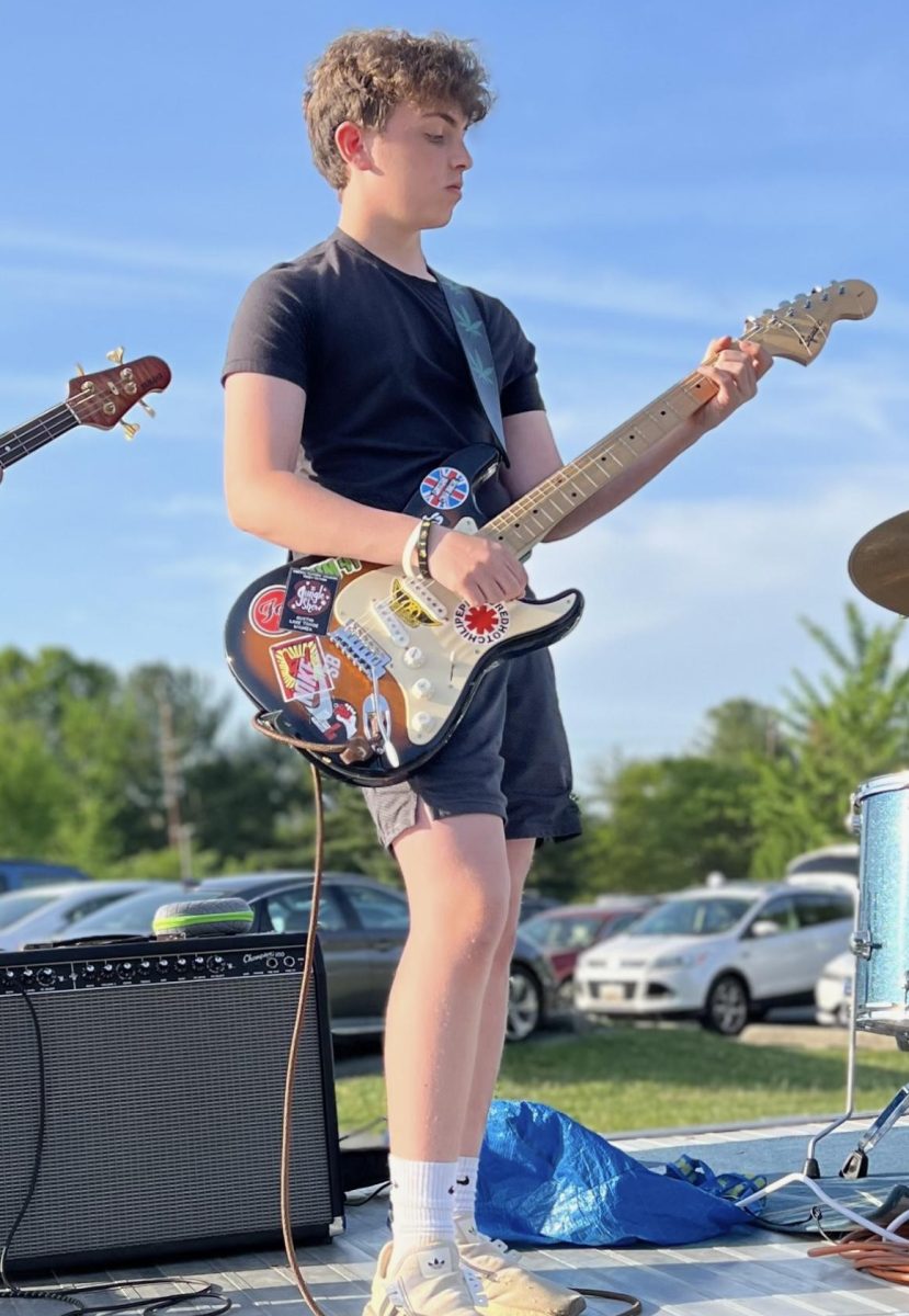 Freshman Meyer Gordon performs at the Cinco de Mayo party at the Needwood golf course. Gordon enjoyed playing live and showcased his talented skills to the audience. (Courtesy Mike Gordon)