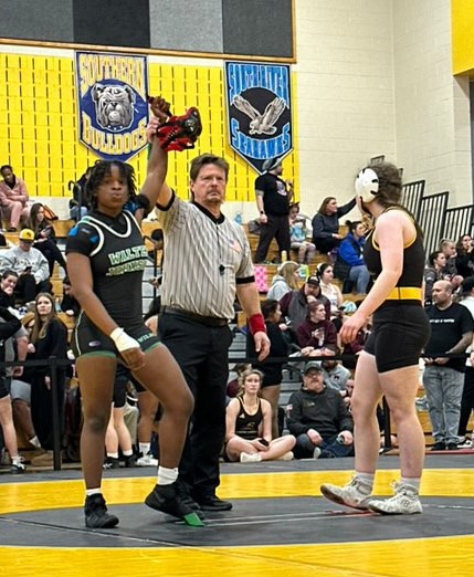 Junior Sonia Pegoue celebrates her win, after beating her opponent during the Who's #1 tournament.
Courtesy Sonia Pegoue