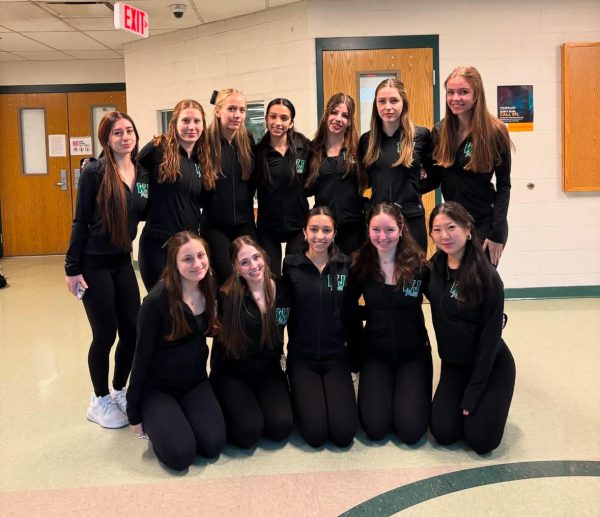 The WJ Poms team poses for a photo a day before the MCPS county championship. The team had a highly successful season, boasting 3 invitational placements.