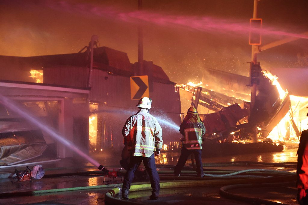 Firefighters work to contain the flames in Los Angeles. The wildfires began in areas surrounding the city but strong winds continued to endanger people in areas nearby. “It's all super complicated what's going on out there. But climate's a driving factor. Power management, water management. I mean, all of it’s a mess in a huge population center,” AP Environmental Science teacher Brock Eastman said. (Via California Department of Forestry and Fire Protection)