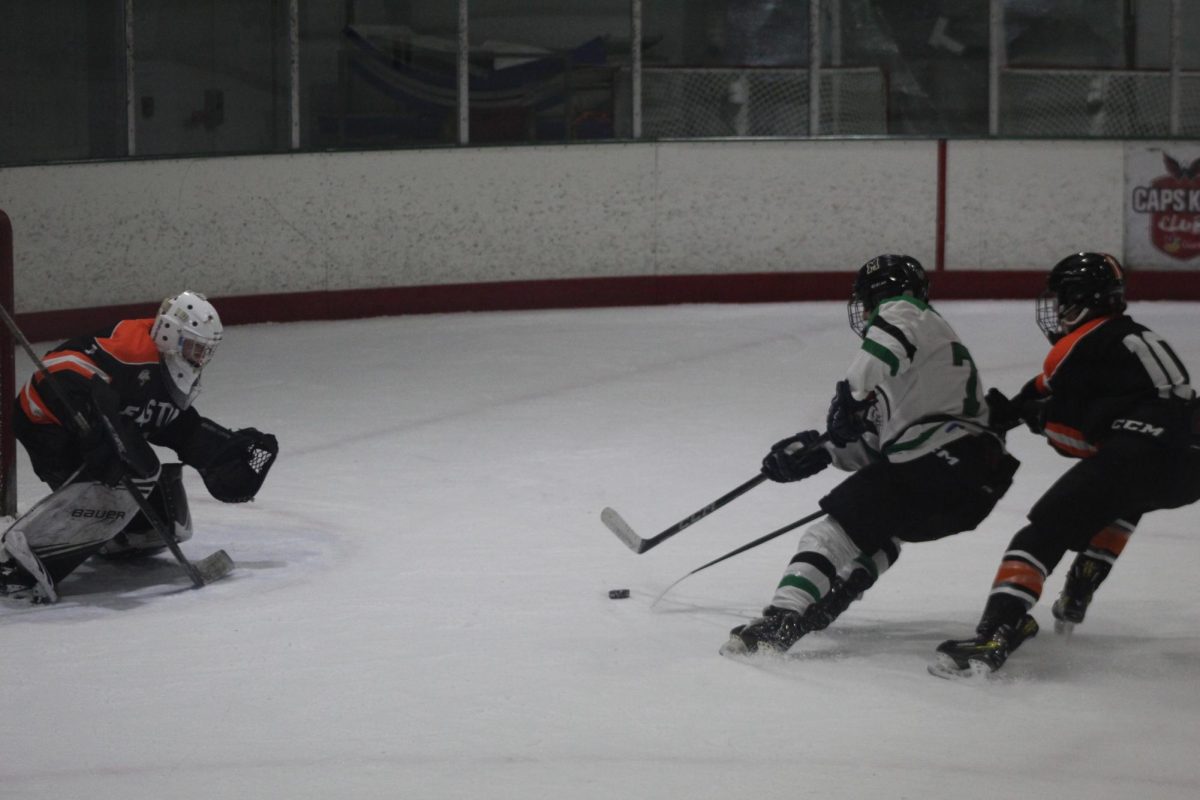 Senior assistant captain Jack Potash breaks away for a one on one chance against the Easton goalie. With a defender on his back, Potash was unable to put this one in the goal; however, the Cats ended the game with seven goals.