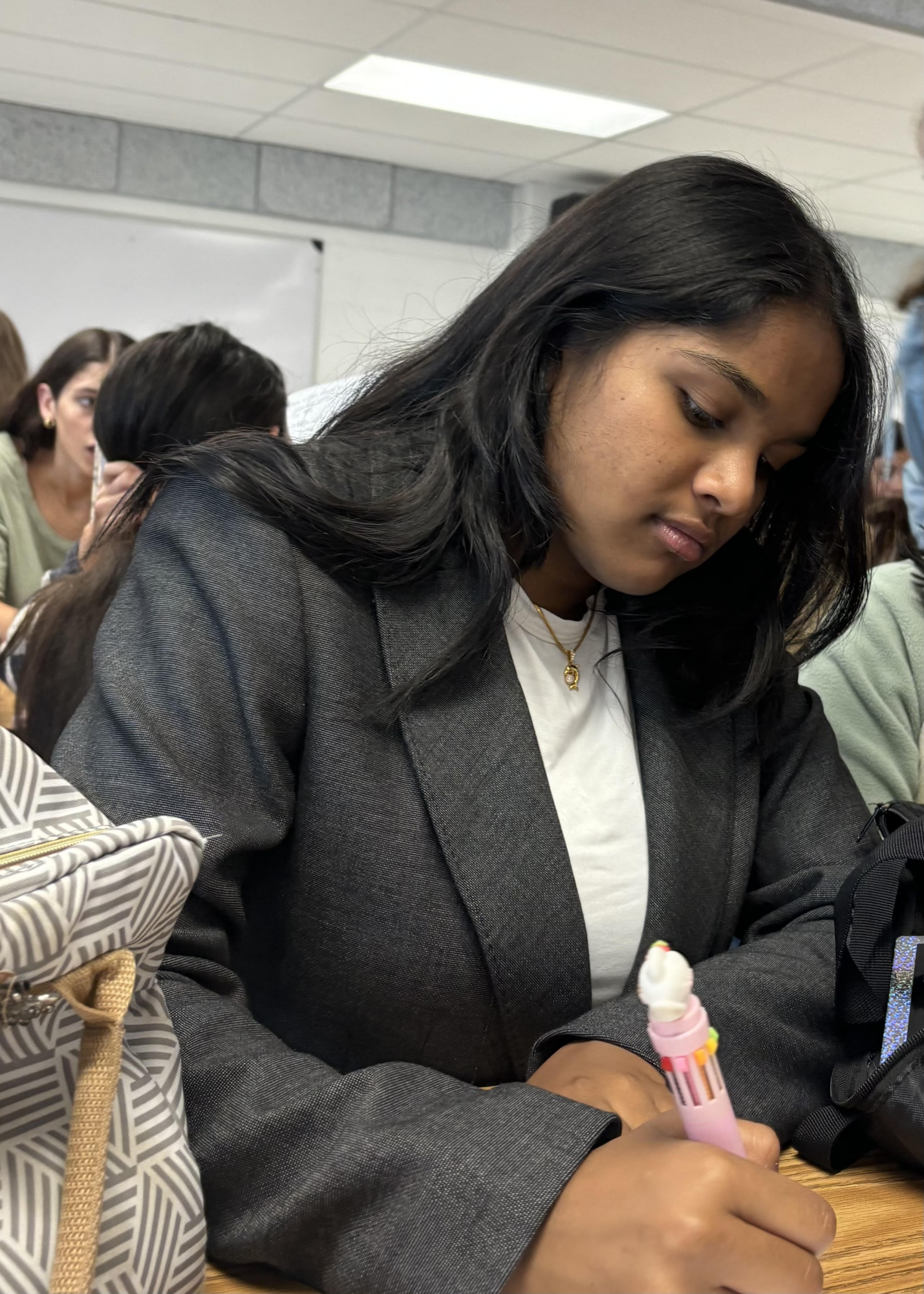 Freshman enterpreneur Renu Vijayaraj balances school with her business. She owns a business called “Shop Oleanders” where she sells accessories and gifts.