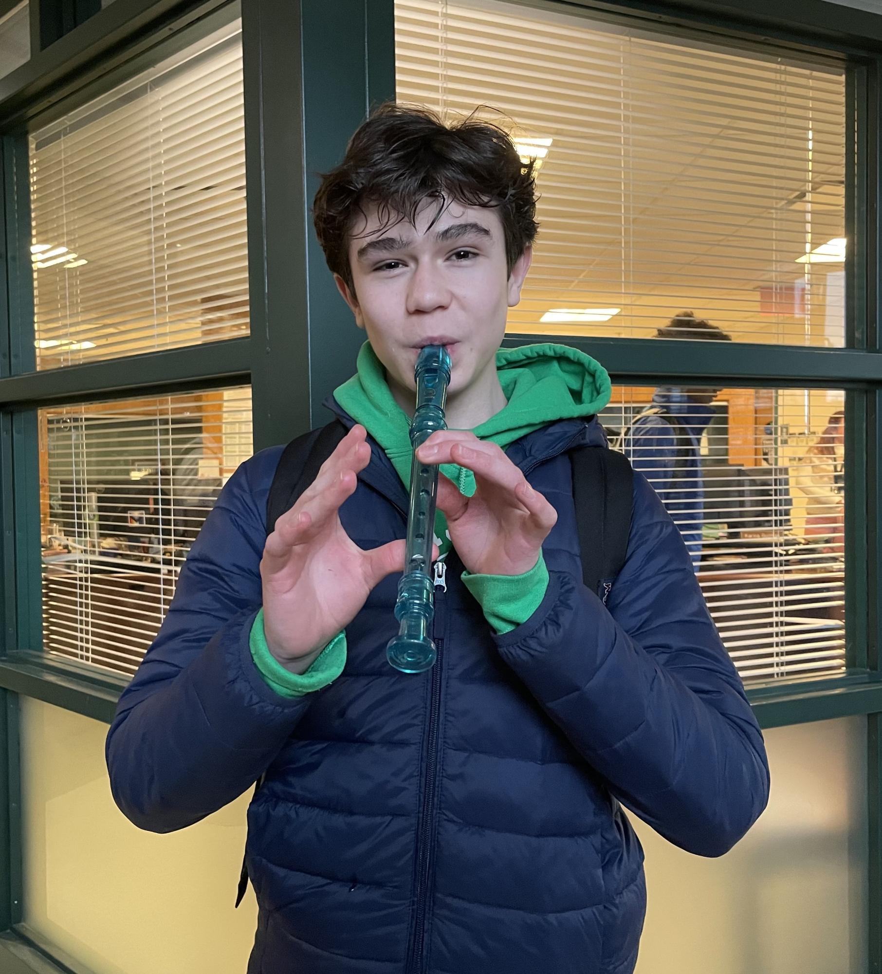 Donning his deep green recorder, freshman Elias Farfan wields his instrument of choice. Sometimes melancholic, but often upbeat, his tunes bring an impactful essence to the school day.