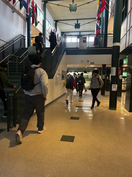 Students enter the building through the main entrance after the bell rings. The school only allows students to enter the building through one set of doors, the main entrance.