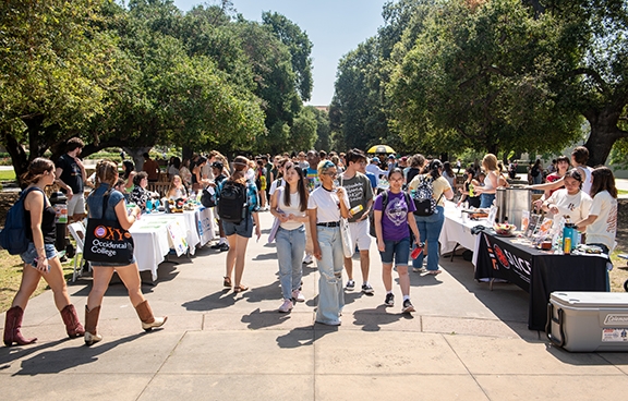 Students attend the college fair, where they can meet new people and find new clubs they would like to join. 