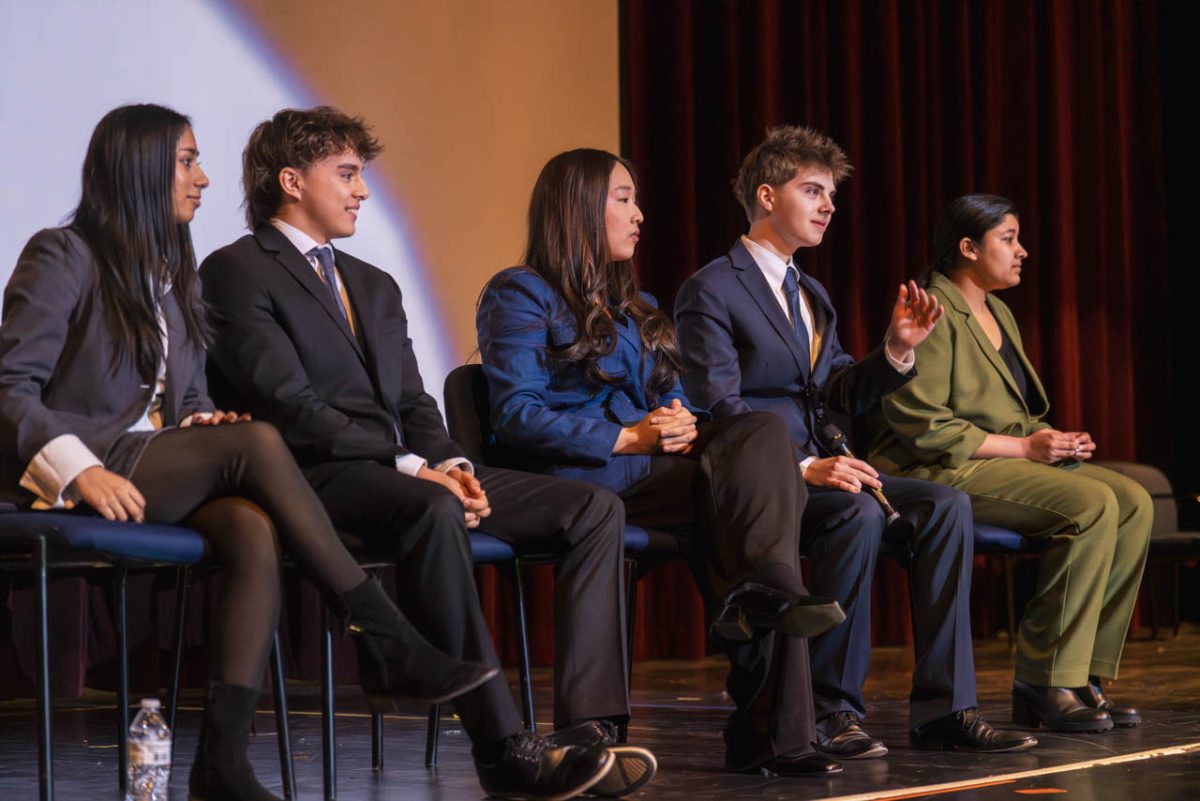 SMOB candidates (left to right), Montgomery Blair High School junior Anuva Maloo, WJ junior Sebastian Hernandez, WJ junior Anna Jhon, Northwest High School junior Peter Boyko and John F. Kennedy High School junior Richa Tripathi sit on stage at the nominating convention, discussing their goals for MCPS.