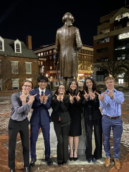 The Prosecution team poses outside of  Frederick County Courthouse after winning against Urbana High School, making them Circuit 6 champions.