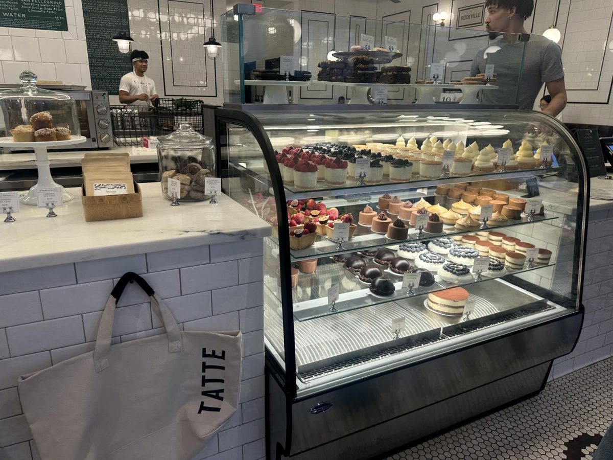 A large lit up case sits in the front next to the check-out counter displaying all of the desserts.
