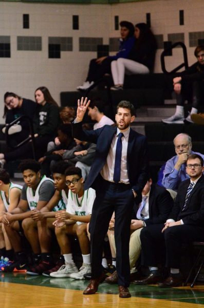 Chase Rieder instructs players during a junior varsity (JV) boys’ basketball game which he coached for five years. Rieder has also worked with the Washington Wizards and coached Northwest to their first regional championship. (Courtesy Lifetouch Studios)