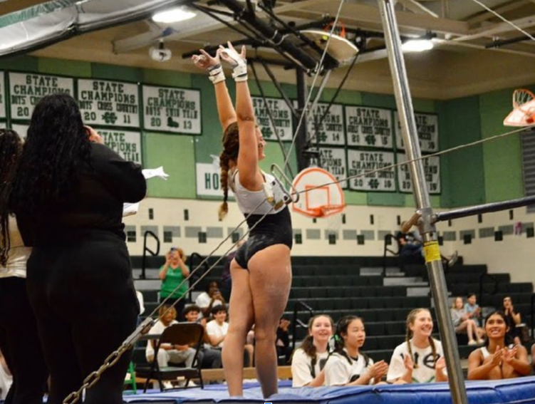 Junior captain Shoshana Berger poses after she dismounts. saluting the judges. (Courtesy Shoshana Berger)