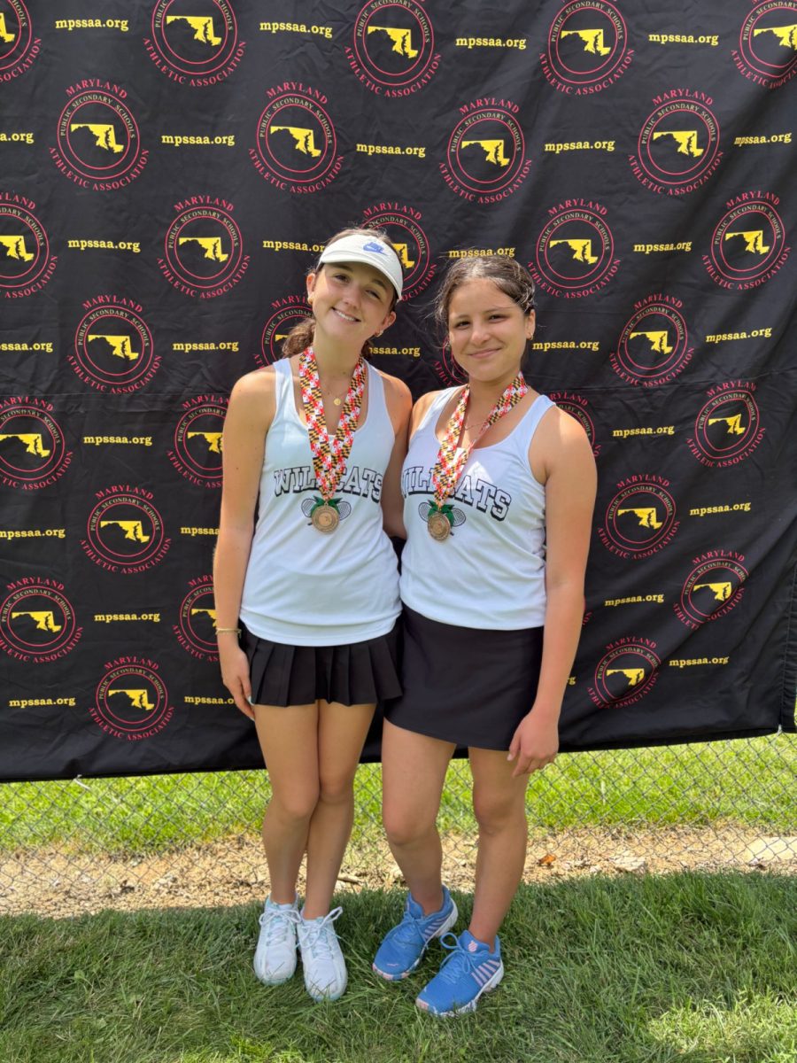 Junior Marie Boy and sophomore Zoe Rojas pose after placing third in the MPSSAA state tournament. The duo lost in the semifinals to RM side Ellen Bu and Jiajing Zheng.