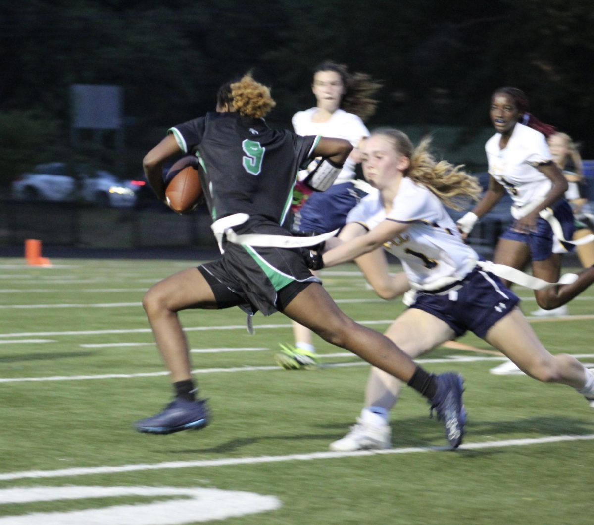 Junior Gabby Buggs swiftly dodging the Barons defense with ease, leading the team to get a first down. Buggs was making solid runs the whole night, giving WJ more possession with the ball.