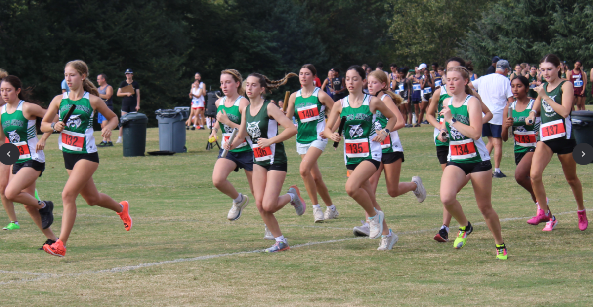 The girls' team gets off to a strong start together at Georgetown Prep's Woodward Relays. Although not a true 5k, this was the Cats' first meet of the season and crucial for them to get off on the right foot.