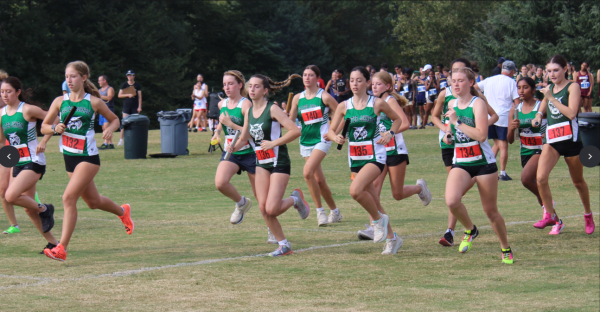 The girls' team gets off to a strong start together at Georgetown Prep's Woodward Relays. Although not a true 5k, this was the Cats' first meet of the season and crucial for them to get off on the right foot.