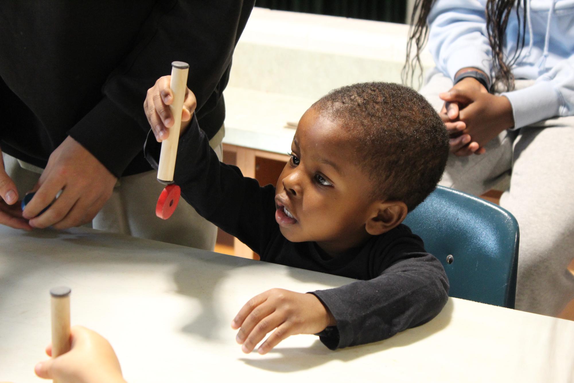 Photo Gallery: National Science Honors Society teaches children from child development