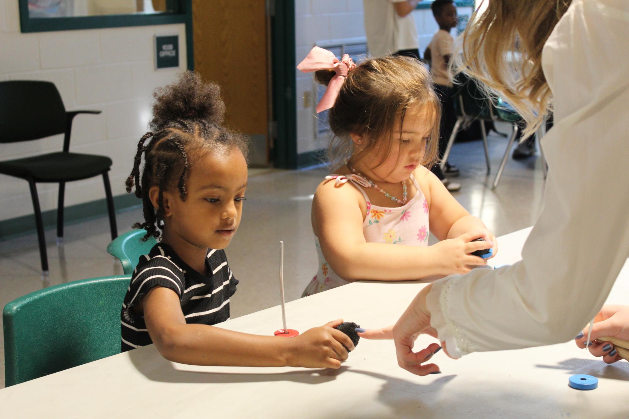 Photo Gallery: National Science Honors Society teaches children from child development