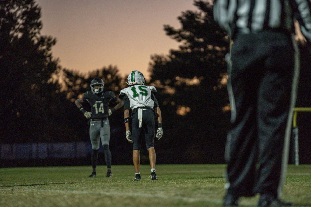 Junior cornerback Theo Ferrs lines up against the Jaguar wide receiver, ready to contain the route and prevent a completion. The Wildcat defense let up 41 points, allowing Northwest to take advantage of all the mistakes in the secondary. (Courtesy of Spencer Robinson)