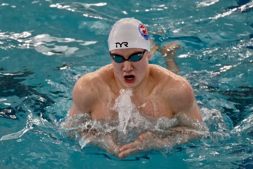 Junior Luc Dionne swims breaststroke his club team. When he's not swimming for club, Dionne can be found breaking school records for WJ. (Courtesy Luc Dionne) 