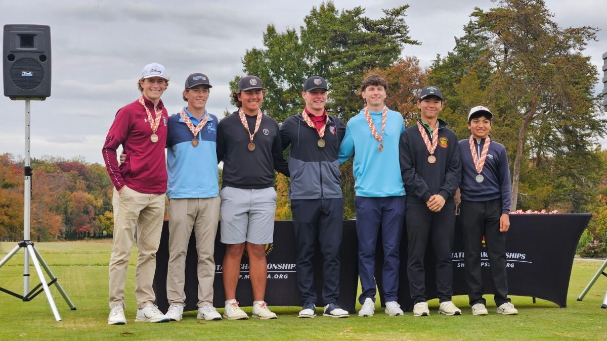Sophomore Ryan Kim(second-right) stands in 3rd place next to the winner after shooting a total score of 151. The score was only two strokes above second place's 149 and narrowly above fourth place's 152. (Courtesy Ryan Kim)