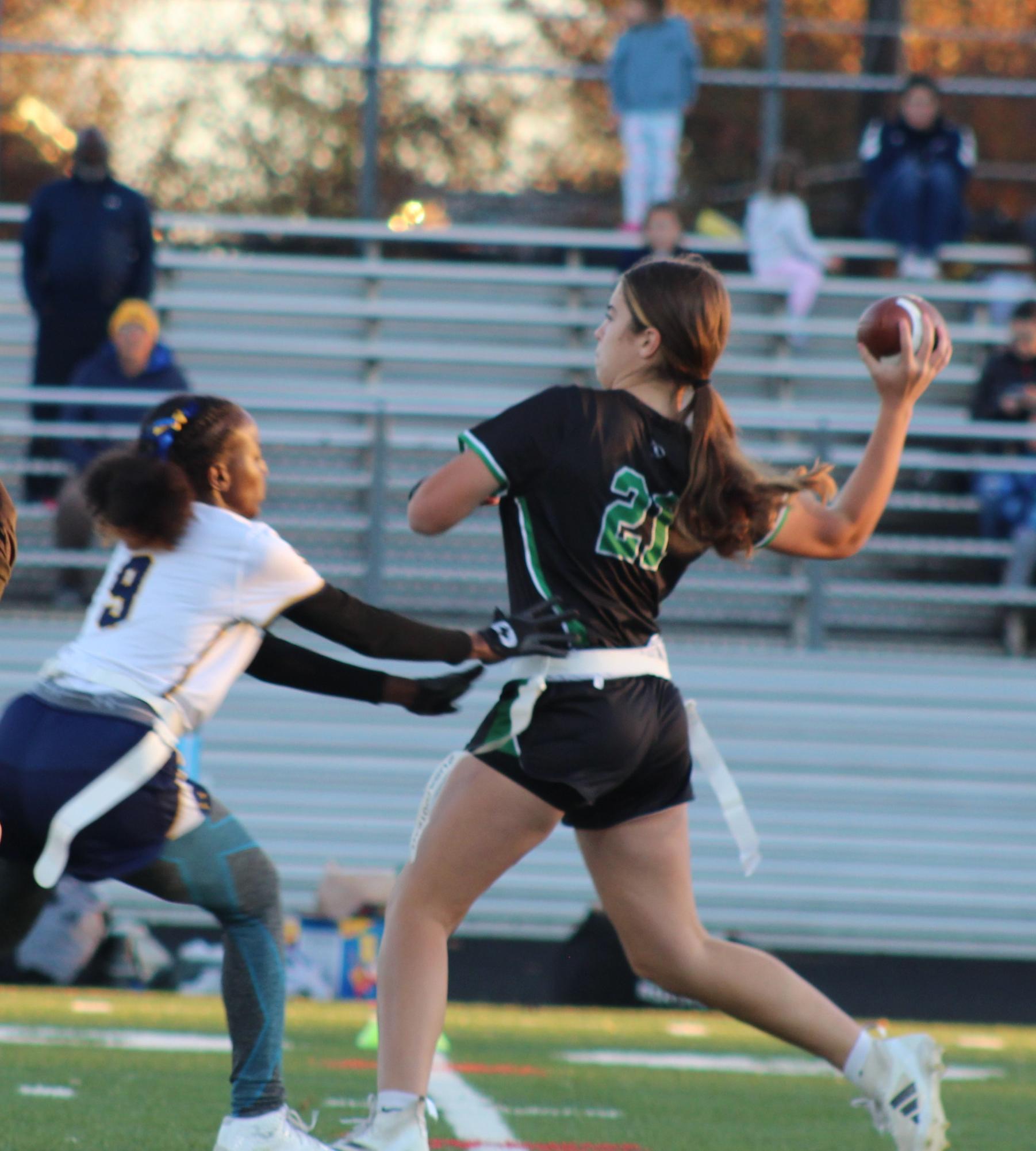 Sophomore Ruby Bonior holds the ball in her possession, trying to fight off a Baron defender while also looking for an open teammate to send the ball down the field to.