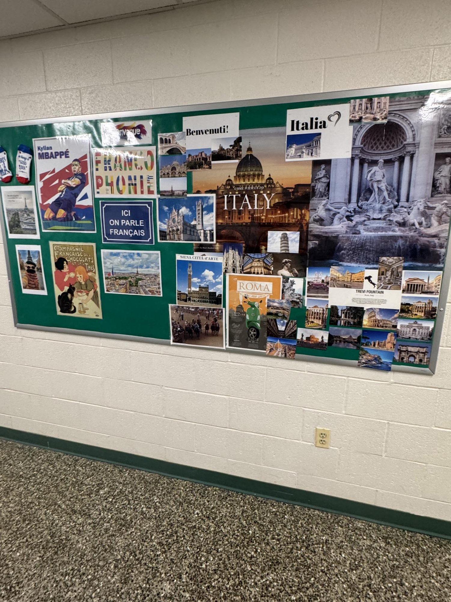 A collage of pictures on the world language bulletin board displays the diversity of cultures represented in WJ. The languages represented on this board are only some of the many languages represented by students.